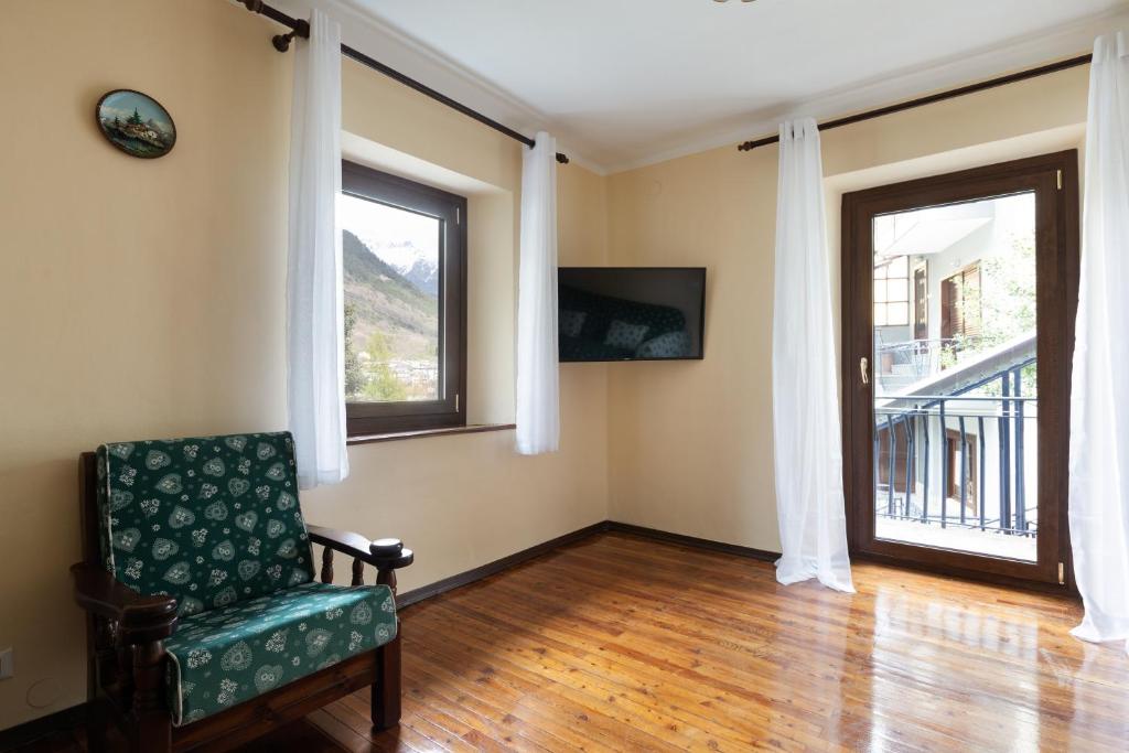 TV a/nebo společenská místnost v ubytování Residence Madamin