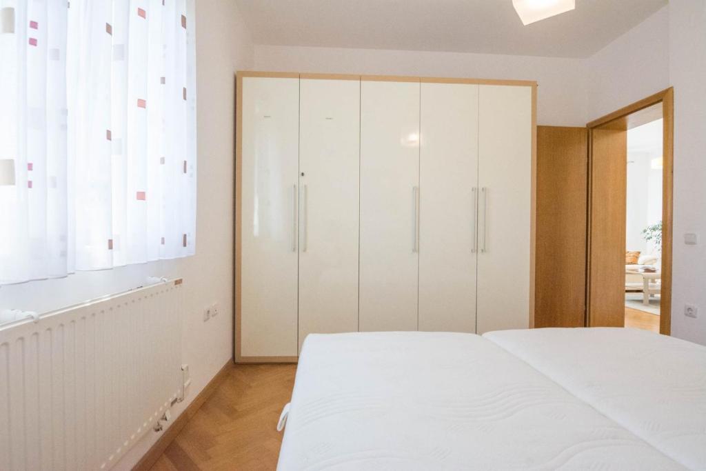 Posteľ alebo postele v izbe v ubytovaní Spacious apartment on a great location -Apartment Kuhta