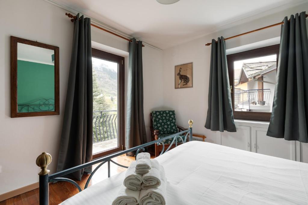 Postel nebo postele na pokoji v ubytování Residence Madamin