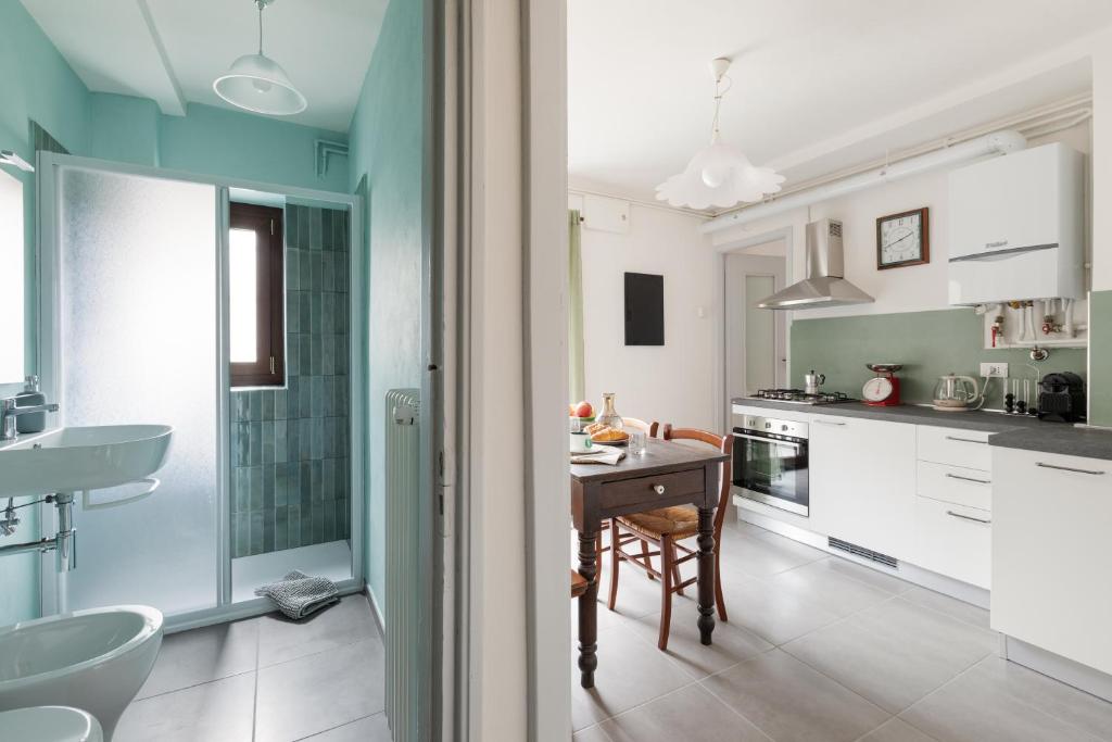 Kuchyň nebo kuchyňský kout v ubytování Residence Madamin