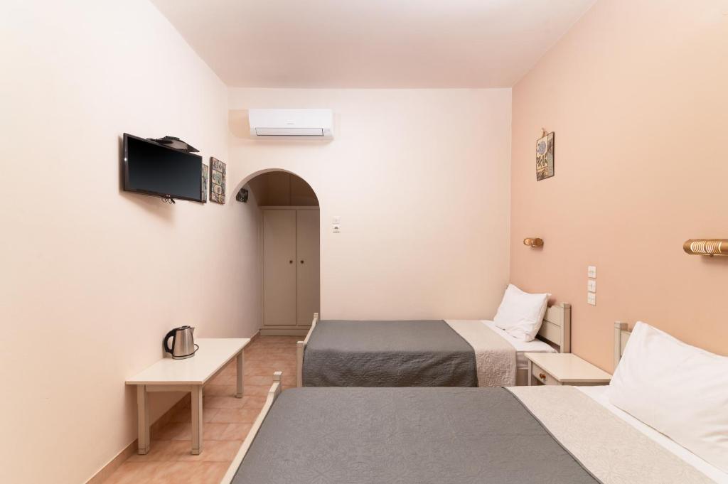 Postel nebo postele na pokoji v ubytování Filia Rooms