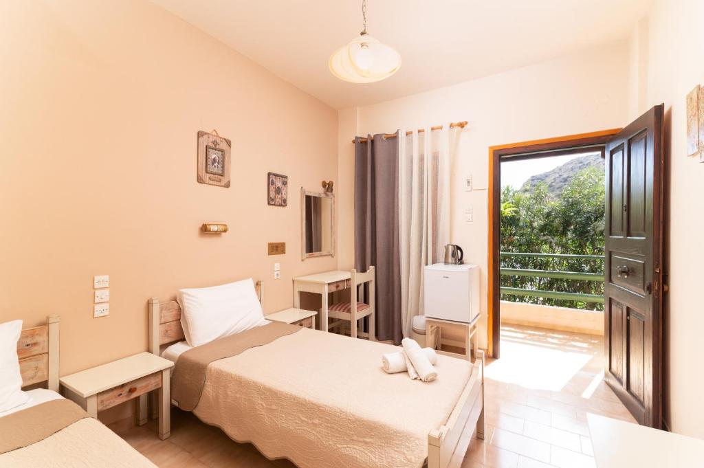 Postel nebo postele na pokoji v ubytování Filia Rooms
