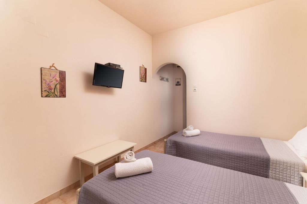 Postel nebo postele na pokoji v ubytování Filia Rooms