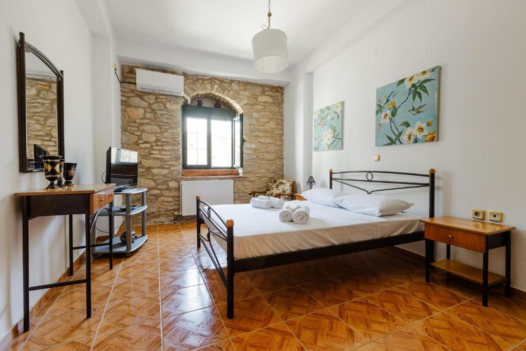 Postel nebo postele na pokoji v ubytování Traditional 3BR Family Home in Pyrgi Village