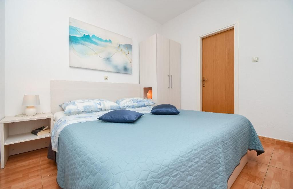 Postel nebo postele na pokoji v ubytování Apartments JoviZe
