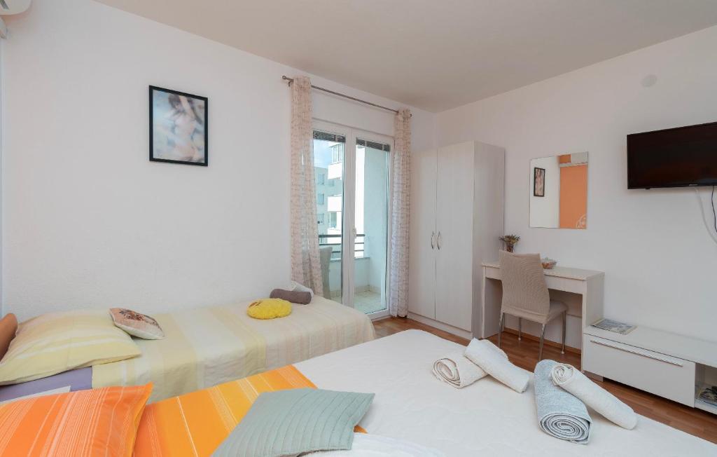 Postel nebo postele na pokoji v ubytování Apartments JoviZe