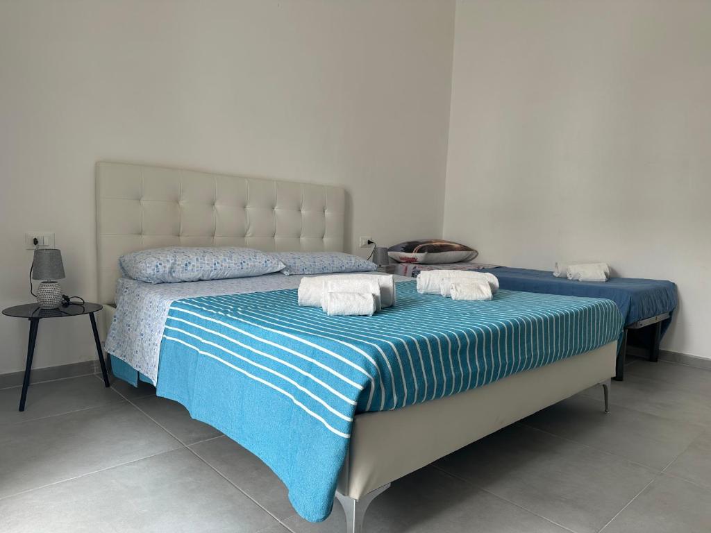 Postel nebo postele na pokoji v ubytování La riva