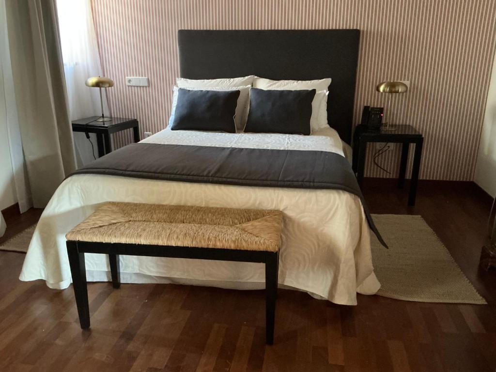 Postel nebo postele na pokoji v ubytování Casón del Conde
