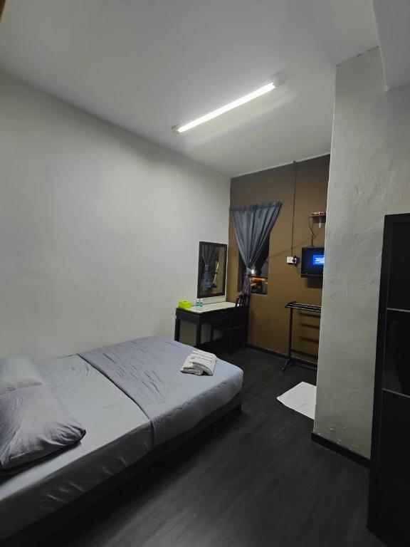 Postel nebo postele na pokoji v ubytování Deummah Guest Room