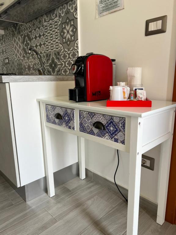 Príslušenstvo na prípravu kávy alebo čaju v ubytovaní Casa Vacanza Elena