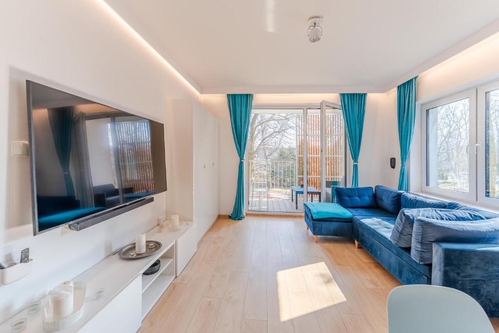 Posezení v ubytování Feniks Seaside Apartment with Pool & near Beach