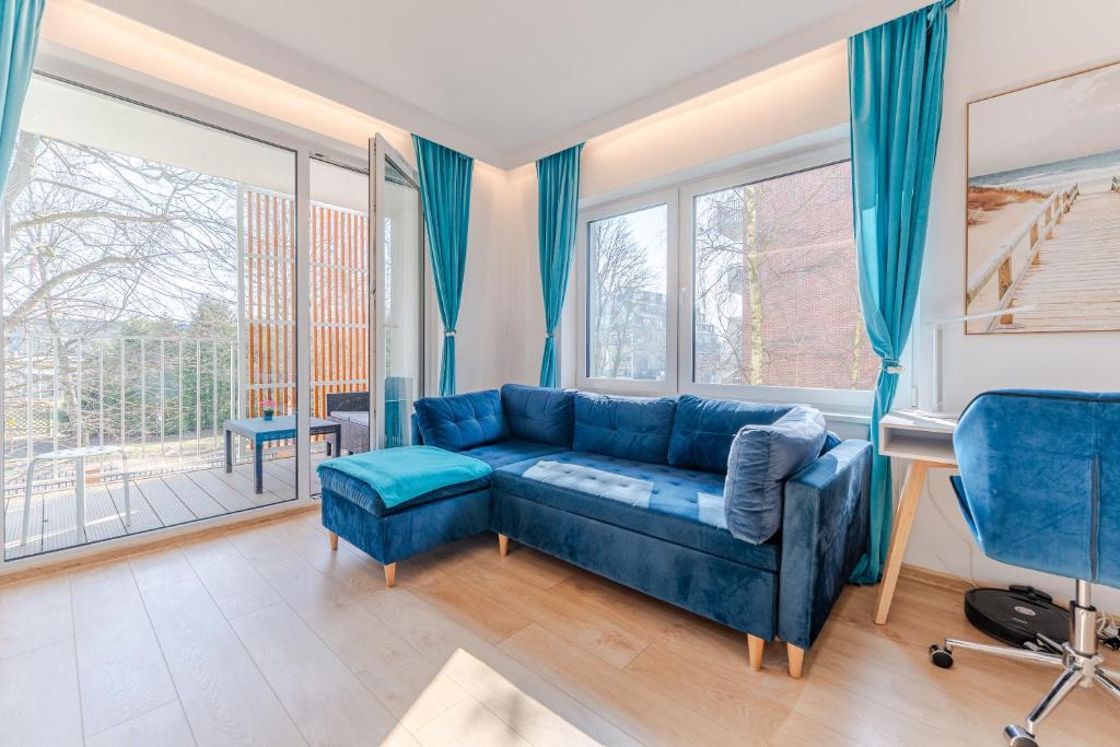 Posezení v ubytování Feniks Seaside Apartment with Pool & near Beach
