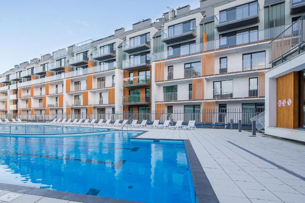 Bazén v ubytování Feniks Seaside Apartment with Pool & near Beach nebo v jeho okolí