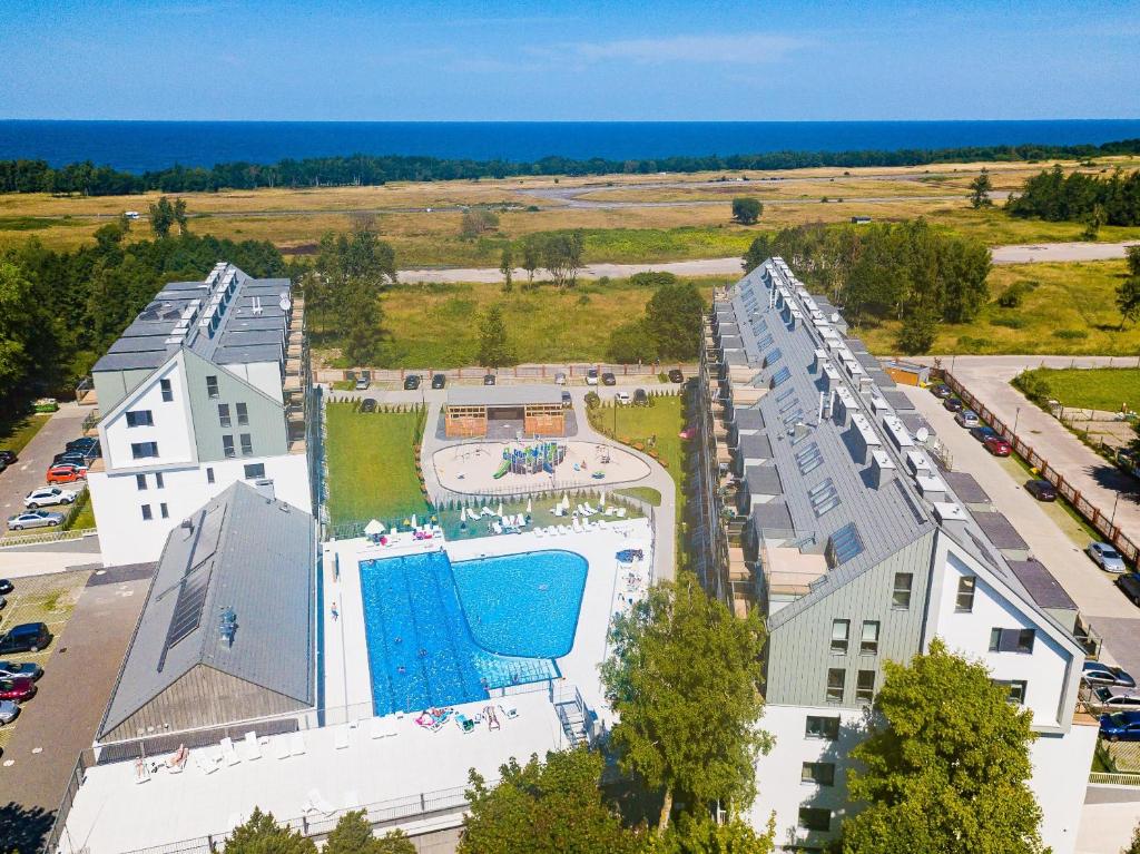 Bazén v ubytování Feniks Seaside Apartment with Pool & near Beach nebo v jeho okolí