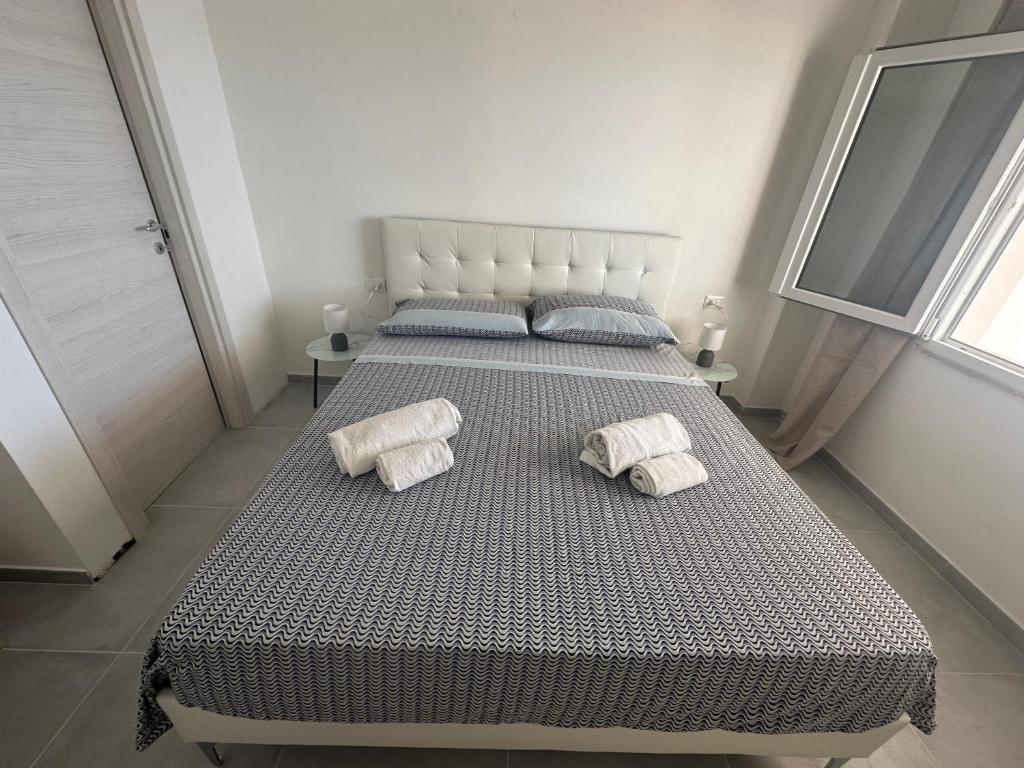 Postel nebo postele na pokoji v ubytování La riva
