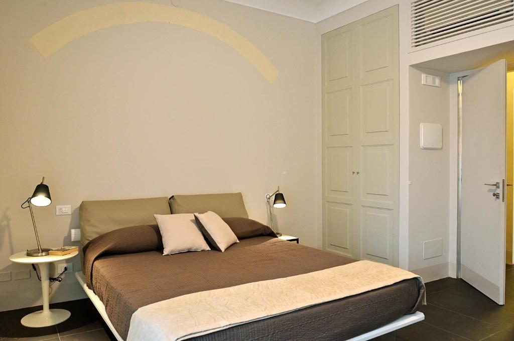 Postel nebo postele na pokoji v ubytování B&B Vicere Speciale