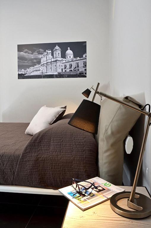 Postel nebo postele na pokoji v ubytování B&B Vicere Speciale