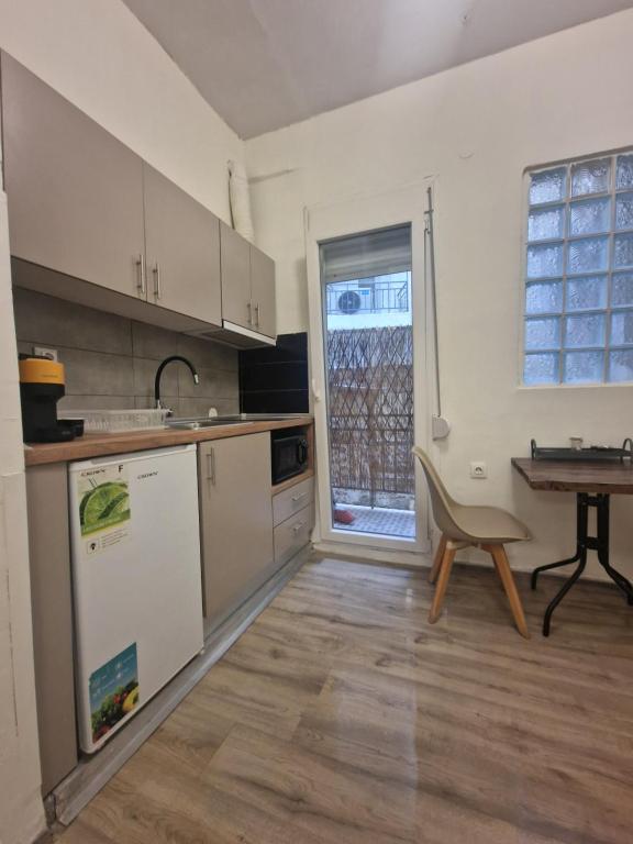 Kuchyň nebo kuchyňský kout v ubytování Closer "Central studio and Apartment"