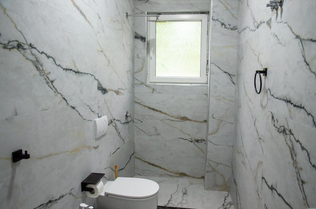 Koupelna v ubytování Hotel ERALD