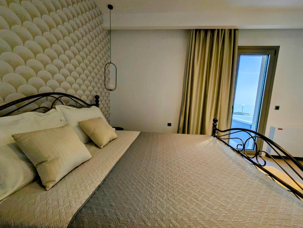 Ένα ή περισσότερα κρεβάτια σε δωμάτιο στο Thea villas 2
