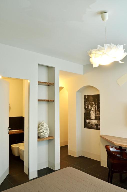 Postel nebo postele na pokoji v ubytování B&B Vicere Speciale