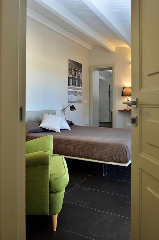Postel nebo postele na pokoji v ubytování B&B Vicere Speciale