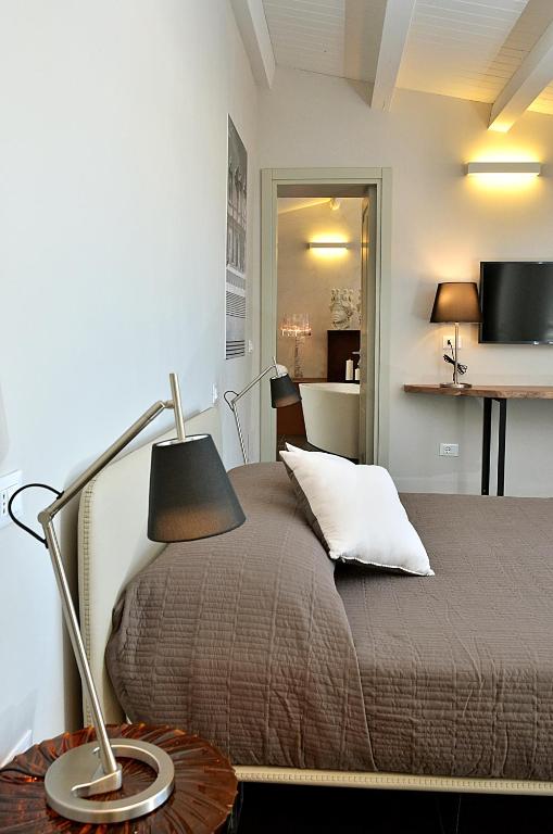 Postel nebo postele na pokoji v ubytování B&B Vicere Speciale