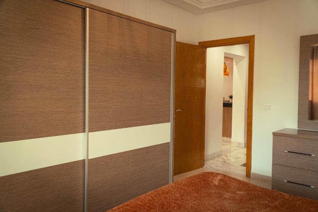 Postel nebo postele na pokoji v ubytování Casa Falaise Monastir