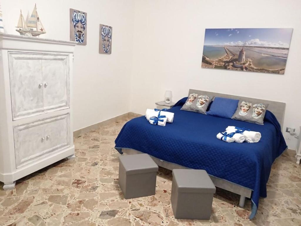 Postel nebo postele na pokoji v ubytování Casa Sciacca La Tua Casa Vacanze Ideale a Marsala