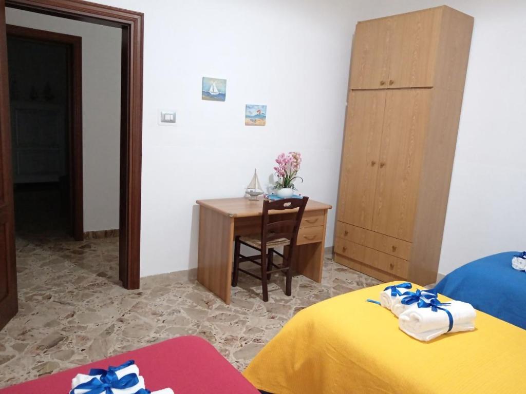 Postel nebo postele na pokoji v ubytování Casa Sciacca La Tua Casa Vacanze Ideale a Marsala