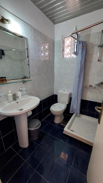 Ein Badezimmer in der Unterkunft Anetis Hotel