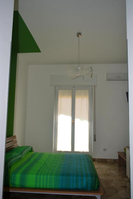 A bed or beds in a room at Porta Nuova