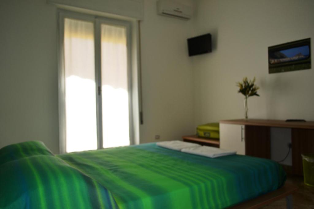A bed or beds in a room at Porta Nuova