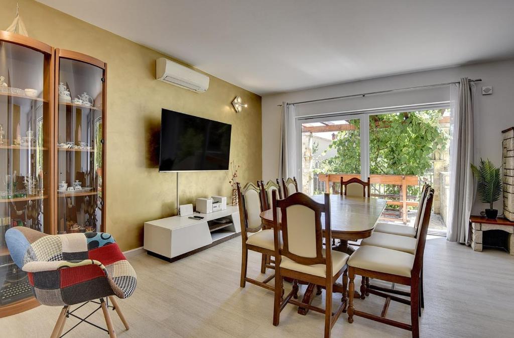 Telewizja i/lub zestaw kina domowego w obiekcie Villa Golf