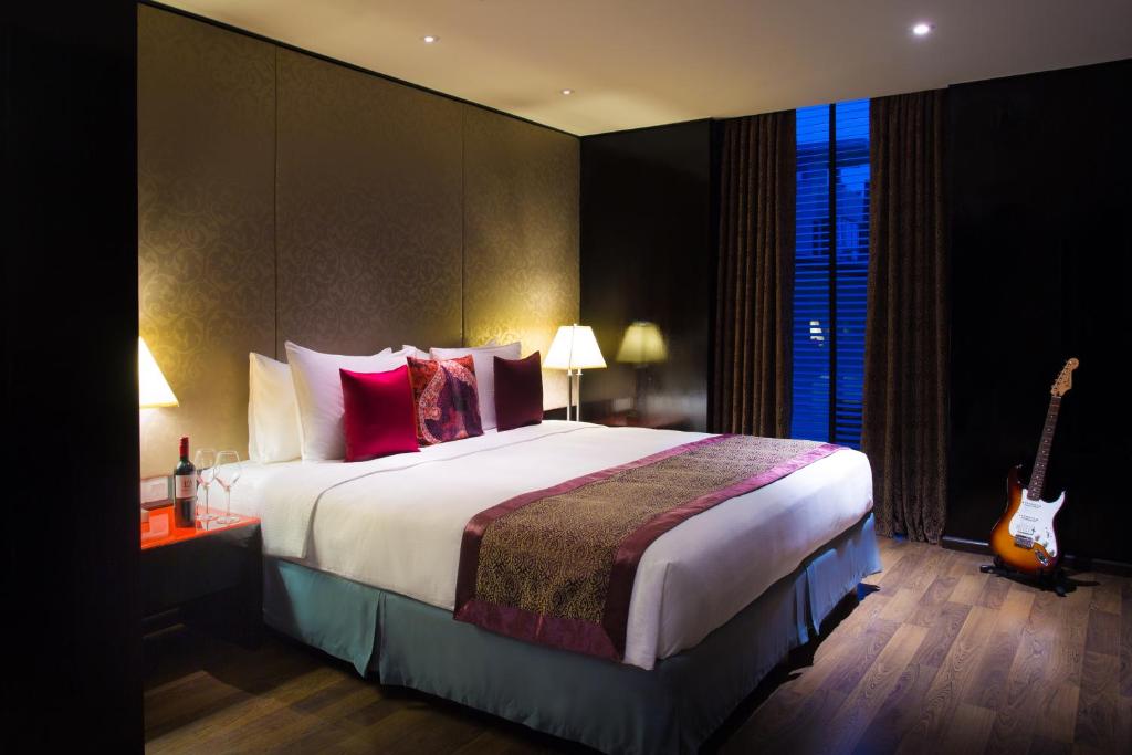 Postel nebo postele na pokoji v ubytování Hard Rock Hotel Goa Calangute
