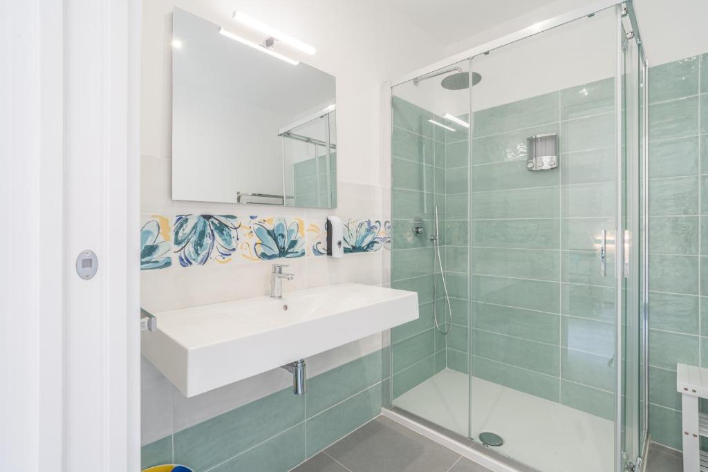 Koupelna v ubytování B&B S'Unda Jara
