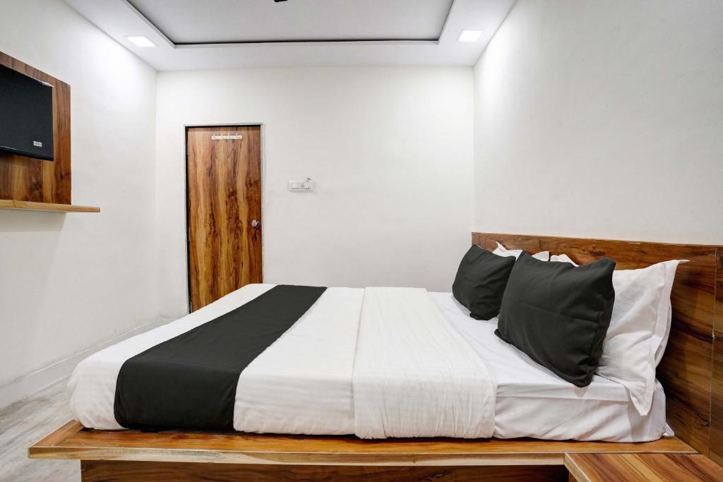 Postel nebo postele na pokoji v ubytování Hotel O Apollo