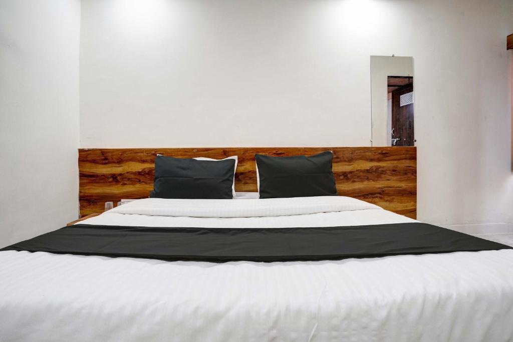 Postel nebo postele na pokoji v ubytování Hotel O Apollo