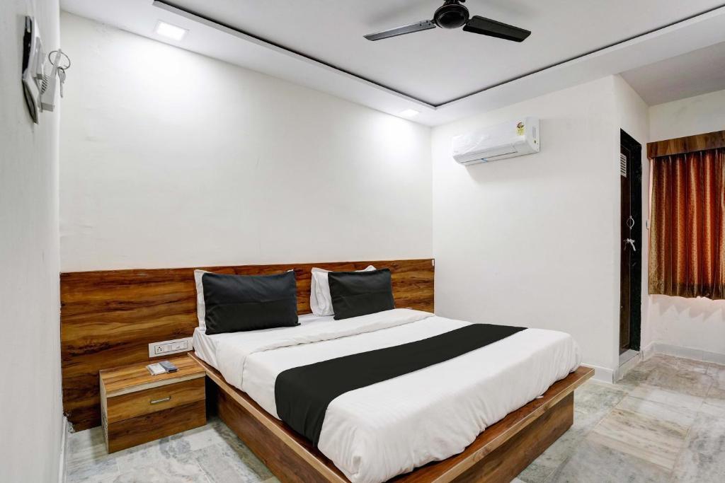Postel nebo postele na pokoji v ubytování Hotel O Apollo