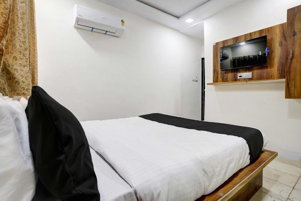 TV a/nebo společenská místnost v ubytování Hotel O Apollo