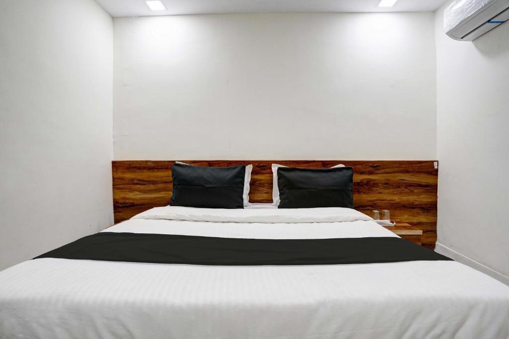 Postel nebo postele na pokoji v ubytování Hotel O Apollo