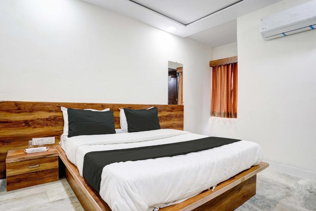 Postel nebo postele na pokoji v ubytování Hotel O Apollo