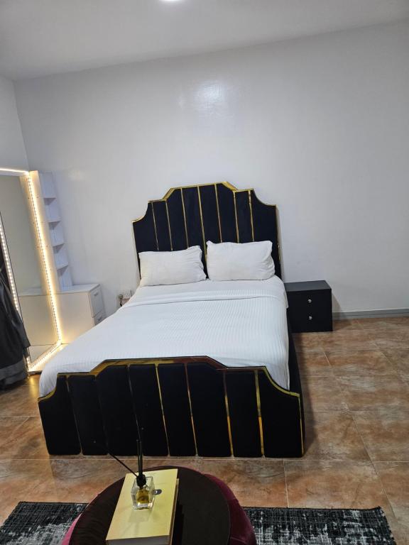 Postel nebo postele na pokoji v ubytování Pearl Homes