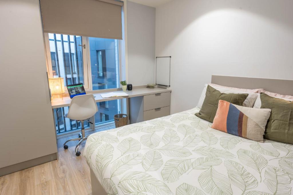 Postel nebo postele na pokoji v ubytování City HideAway