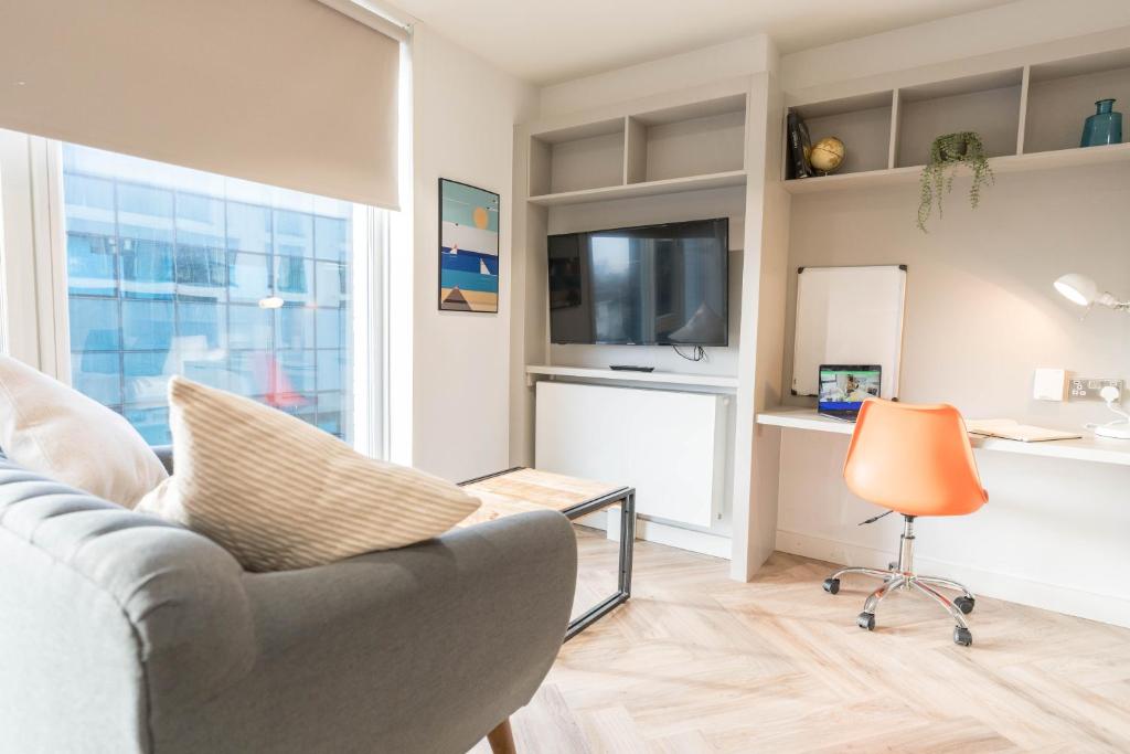 TV a/nebo společenská místnost v ubytování City HideAway