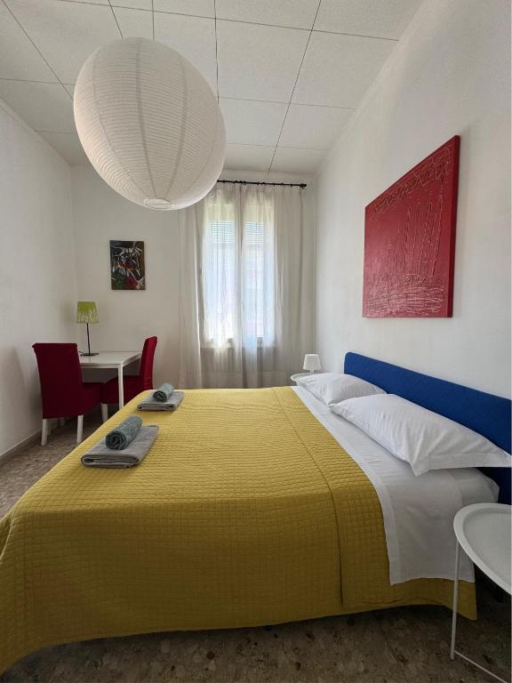 Postel nebo postele na pokoji v ubytování Giove Rooms