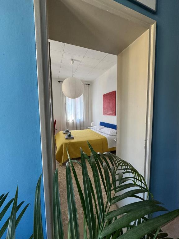 Postel nebo postele na pokoji v ubytování Giove Rooms