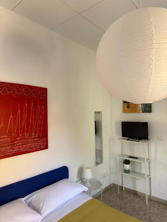 TV a/nebo společenská místnost v ubytování Giove Rooms
