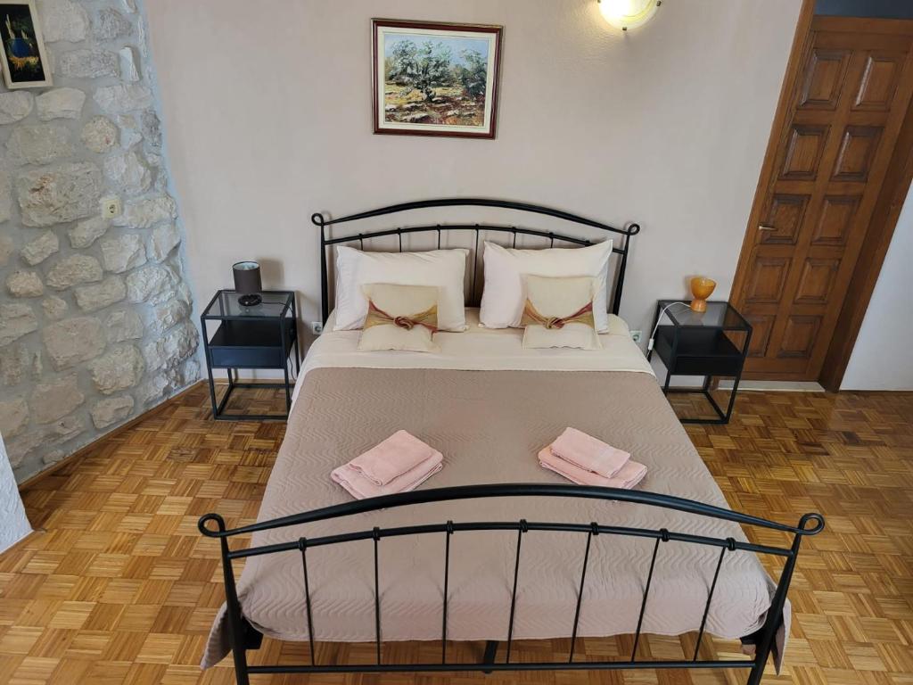 Postel nebo postele na pokoji v ubytování Palace Derossi