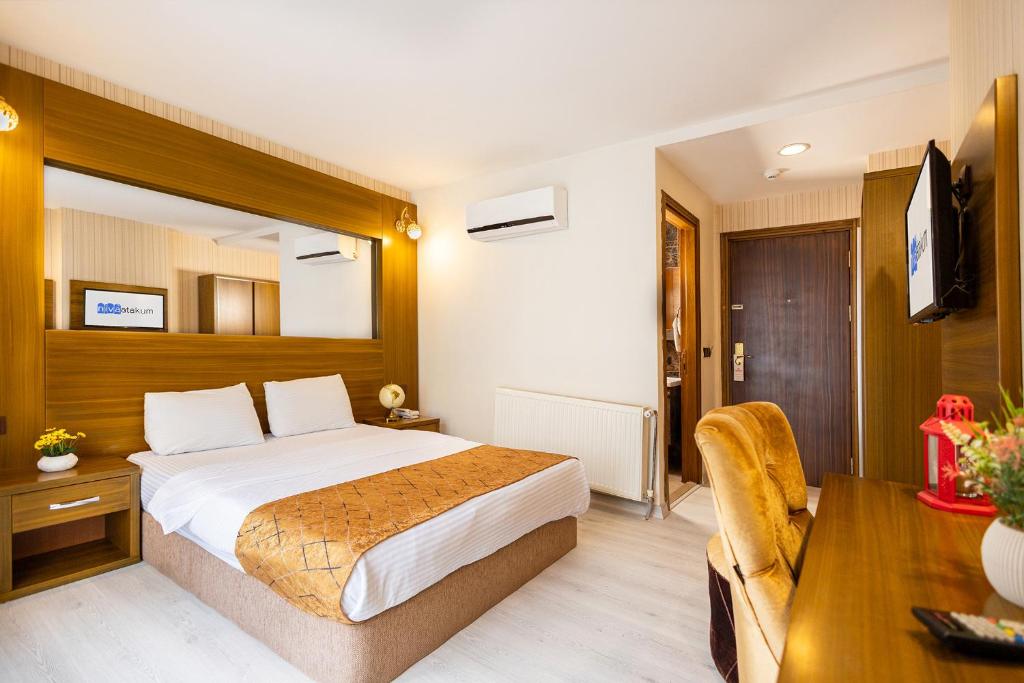 Postel nebo postele na pokoji v ubytování Niva Atakum Otel